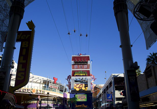 People fly on the Slotzilla Zoomline in downtown Las Vegas Sunday, Nov. 1, 2015.