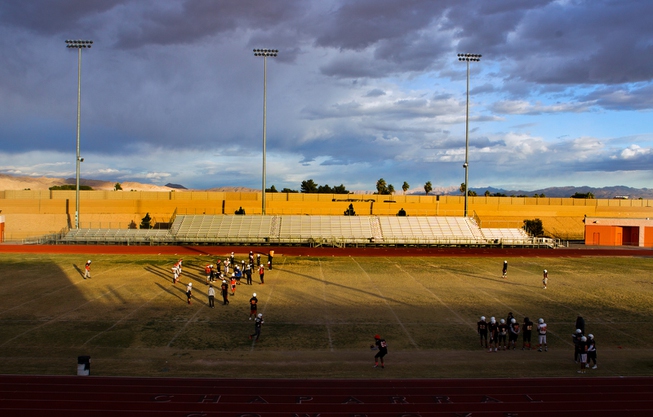 Chaparral High School football players practice into the late day ...