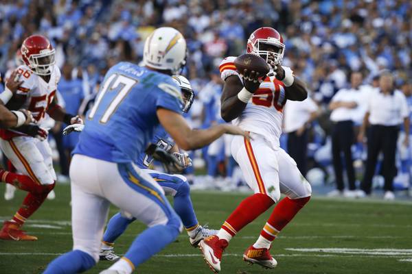 Houston's pick-6, Poe's TD run carry Chiefs over Chargers