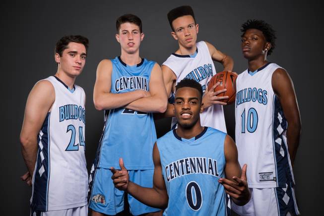 From left, Centennial basketball players; Roy Sparks, Jake Hutchings, Darian Scott and Isaiah Banks. Front: Troy Brown Jr., Thursday, Nov. 12, 2015.