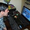 In this Nov. 26, 2013, photo, Jon Hernandez chooses from several games of online poker from his home in Roselle Park, N.J., the day after New Jersey began offering Internet gambling statewide.