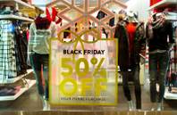 Signs related to Black Friday shopping are all about the Fashion Show Mall on Friday, November 27, 2015.
