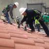 SolarCity workers practice installing solar panels at the company's new facility in Las Vegas.

