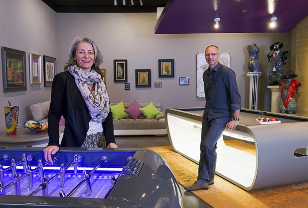 Owners Sylvie and Pascal Becourt pose in a room at Sud France Design, 7650 South Dean Martin Dr Suite #106, Tuesday, Dec. 1, 2015.