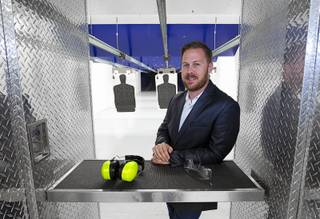 Brian Doleshal, general manager for The Range 702, poses in the VIP range at 5999 Dean Martin Dr. Tuesday, Dec. 1, 2015.