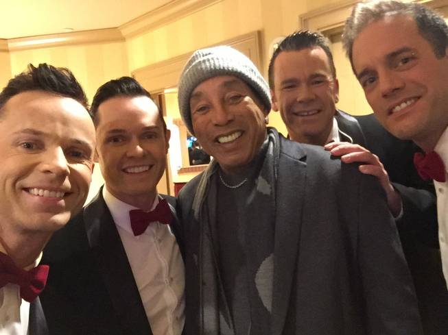 Human Nature — Michael Tierney, Andrew Tierney, Phil Burton and Toby Allen — flank Smokey Robinson on Monday, Nov. 30, 2015, at the Venetian.