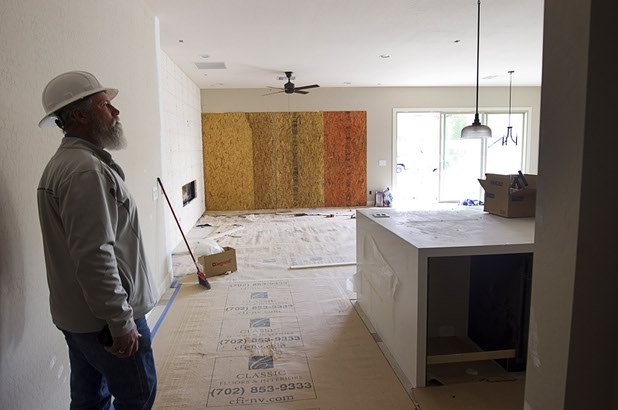 Project manager Dale Juilfs looks over a model home under construction at The Estates at Rhodes Ranch, a Century Communities development, Thursday, Dec. 3, 2015.
