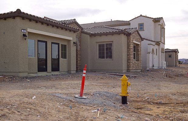 Model homes are shown under construction at The Estates at Rhodes Ranch, a Century Communities development, Thursday, Dec. 3, 2015.