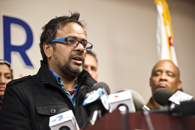 Farhan Khan, brother-in-law of one of the suspects involved in a shooting in San Bernardino, Calif., speaks during a news conference at the Greater Los Angeles Area office of the Council on American-Islamic Relations, in Anaheim, Calif. 