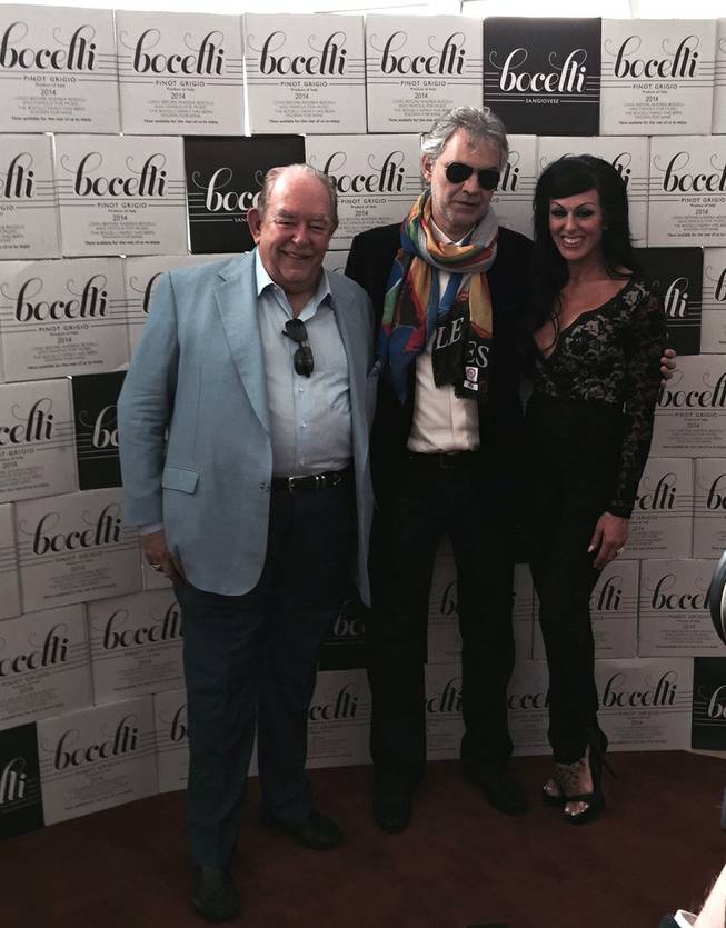 Andrea Bocelli is flanked by Robin Leach and Jennifer Romas at the Cleveland Clinic Lou Ruvo Center for Brain Health on Sunday, Dec. 6, 2015, in Symphony Park downtown.