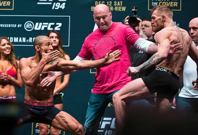 UFC 194 weigh-in: McGregor enlivens for Irish fans, clashes with Aldo ...