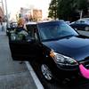 Katie Baranyuk gets out of a car driven by Dara Jenkins, a driver for the ride-sharing service Lyft, after getting a ride to downtown Seattle on March 12, 2014. Seattle may soon become the first city to let drivers of ride-hailing companies such as Uber and Lyft collectively bargain over pay and working conditions.