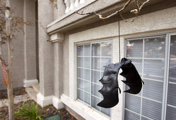 Halloween decorations are shown in front of a house previously occupied by squatters in the northwest part of the valley Dec. 9, 2015. Neighbors said the occupants threw a Halloween party that got out of hand and ended in an early morning shooting.