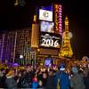 Midnight arrives for a crowd of revelers along Flamingo Avenue at Las Vegas Boulevard on New Year’s Eve on Thursday, Dec. 31, 2015.
