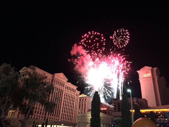 Fireworks are shown along the Strip ushering in 2016 in Las Vegas.