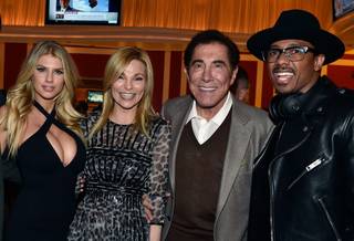 Charlotte McKinney, with Andrea Wynn, Steve Wynn and Nick Cannon, hosts the grand opening of Encore Players Club on Wednesday, Jan. 6, 2016, at Encore.