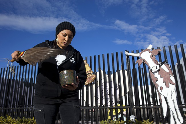 Fawn Douglas, a member of the Las Vegas Paiute tribe, lights sage during a gathering at Boulder Plaza in the Arts District Sunday, Jan 10, 2016. Native American youth and others held the gathering to protest the ongoing occupation of the Maher Wildlife Refuge in Oregon as well as Cliven Bundys unpunished illegal grazing in Southern Nevada.