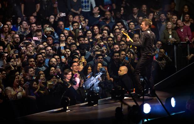 Muse frontman and guitarist Matt Bellamy performs Saturday, Jan. 9, ...