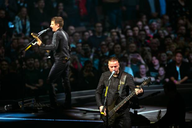 Muse bass guitarist Chris Wolstenholme and frontman and guitarist Matt ...