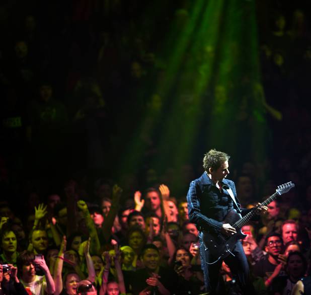 Muse frontman and guitarist Matt Bellamy performs Saturday, Jan. 9, ...