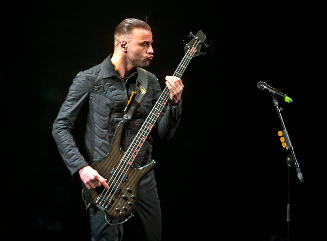Muse bass guitarist Chris Wolstenholme performs Saturday, Jan. 9, 2016, at Mandalay Bay Events Center.