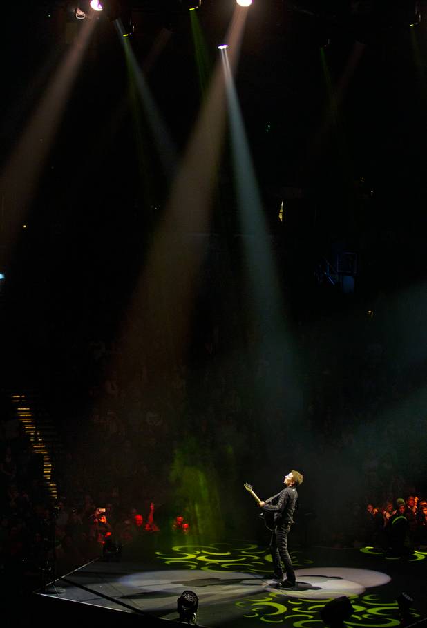 Muse frontman and guitarist Matt Bellamy performs Saturday, Jan. 9, ...