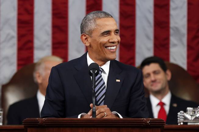 President Barack Obama smiles during his State of the Union address to a joint session of Congress on Capitol Hill in Washington, Tuesday, Jan. 12, 2016. 