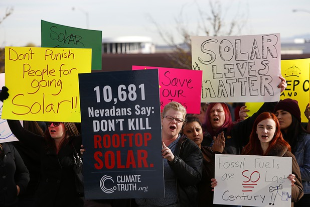 Solar supporters rally in front of Public Utilities Commission offices Wednesday, Jan 13, 2016.