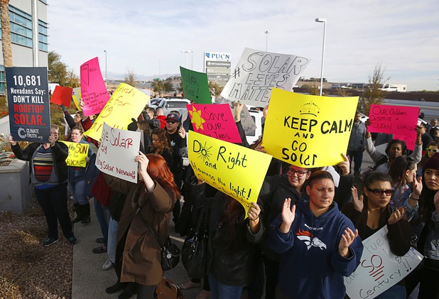 Solar supporters rally Wednesday, Jan. 13, 2016, in front of Public Utilities Commission offices.