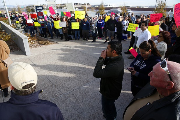 Solar supporters rally in front of the Public Utilities Commission offices Wednesday, Jan 13, 2016.