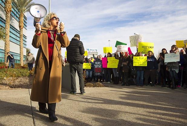 Debbie Dooley of Altanta, Georgia, founder of Conservatives for Energy Freedom, rallies solar supporters in front of Public Utilities Commission offices Wednesday, Jan 13, 2016.