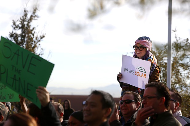 Solar supporters rally in front of Public Utilities Commission offices Wednesday, Jan 13, 2016.