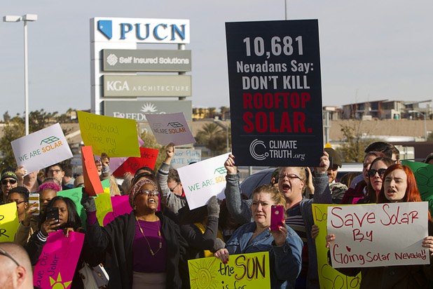 Solar supporters rally in front of Public Utilities Commission offices Wednesday, Jan 13, 2016.