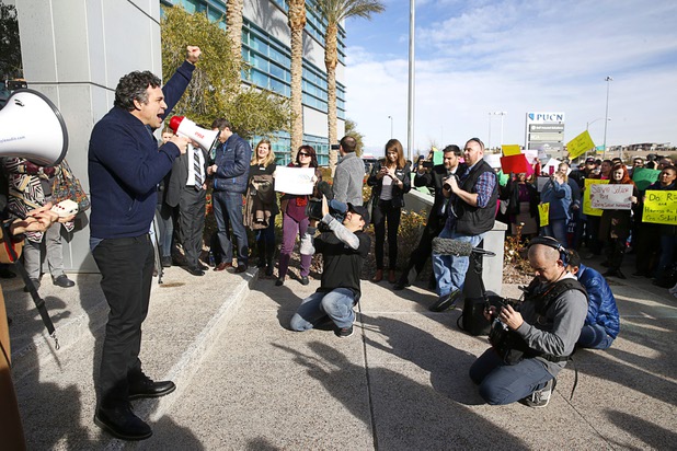 Actor Mark Ruffalo, left, rallies solar supporters in front of Public Utilities Commission offices Wednesday, Jan 13, 2016.