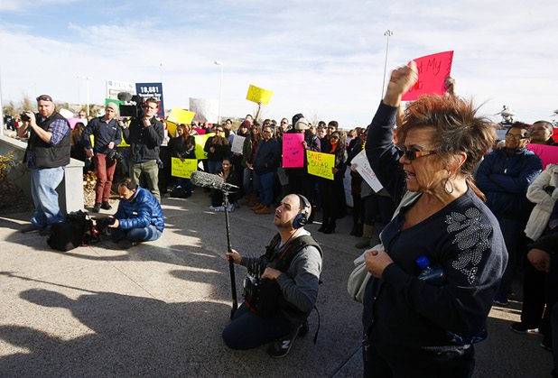 Solar supporters rally in front of Public Utilities Commission offices Wednesday, Jan 13, 2016.
