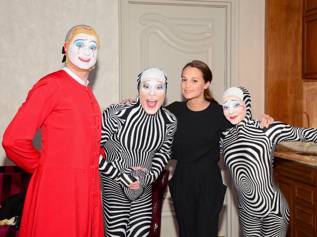 Alicia Vikander with cast members from Cirque du Soleil’s “O” on Wednesday, Jan. 13, 2016, at Bellagio.