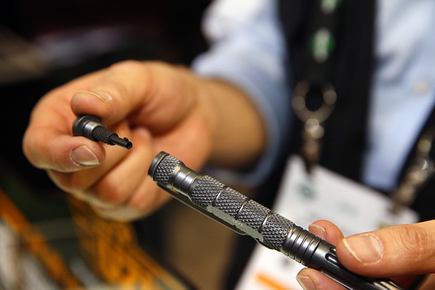 An Uzi Tactical Pen with a hidden handcuff key is displayed in the Campco booth during the SHOT (Shooting, Hunting and Outdoor Trade) Show at the Sands Expo Tuesday, Jan. 19, 2016.