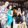 A fan takes a photo with Vicki Chase during the 2016 AVN/Adult Entertainment Expo on Wednesday, Jan. 20, 2016, at the Hard Rock Hotel.