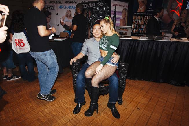 A fan takes a photo during the 2016 AVN/Adult Entertainment ...