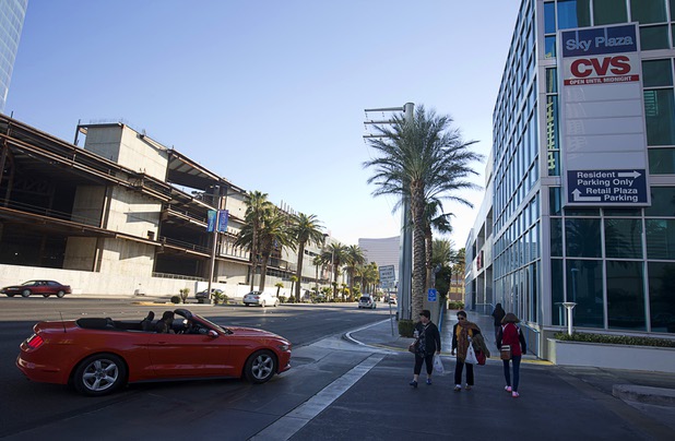 Pedestrians pass by the CVS Pharmacy in Sky Las Vegas tower, 2700 Las Vegas Boulevard South, Thursday, Jan. 28, 2016. The pharmacy has been listed for sale.