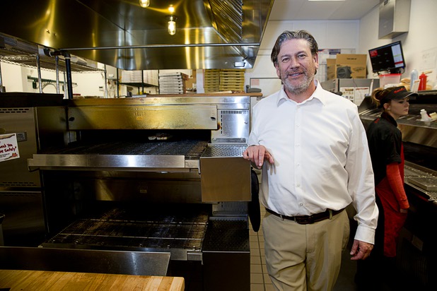 Bryon Stephens, president and COO of Marco's Pizza, poses in the Marco's Pizza shop at 3400 S. Hualapai Way Thursday, Feb. 4, 2016. Stephens recently appeared on the CBS show "Undercover Boss."  The franchise has nearly 700 locations in 35 states and plans to open 8 more restaurants in the Las Vegas Valley, Stephens said.