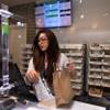 An employee fills an order for a card holder during the Grand Opening Celebration and Open House for The+Source marijuana dispensary on Saturday, January 30, 2016.  L.E. Baskow