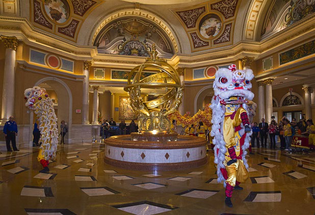 Lion and dragon dancers perform in the Venetian lobby during Chinese New Year celebrations at the Venetian and Palazzo Monday, Feb. 8, 2016. The Chinese New Year, the Year of the Monkey, began Monday.