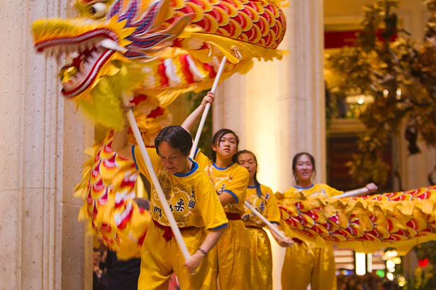 Dragon dancers perform in the Waterfall Atrium and Gardens of The Palazzo during Chinese New Year celebrations Monday, Feb. 8, 2016. The Chinese New Year, the Year of the Monkey, began Monday.
