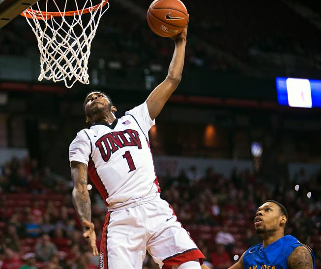 UNLV forward Derrick Jones Jr. (1) elevates for a dunk off of fast break over San Jose State at the Thomas & Mack Center on Wednesday, February 10, 2016.