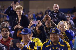Soccer fans take photos before the California Clasico game between the Los Angeles Galaxy and San Jose Earthquakes Saturday, Feb. 13, 2016 at Cashman Field.