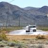 A water truck wets down an area being prepared for a medical marijuana complex in the in the Apex Industrial Park near Interstate 15 and Highway 93, north of Las Vegas Wednesday, Feb. 17, 2016. Electric car start-up Faraday Future plans to build a $1 billion auto plant in the park.