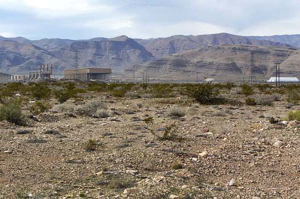 Land is shown in the Apex Industrial Park near Interstate 15 and Highway 93, north of Las Vegas Wednesday, Feb. 17, 2016. NV Energy's Chuck Lenzie Generating Station is at left. Electric car start-up Faraday Future plans to build a $1 billion auto plant in the park.