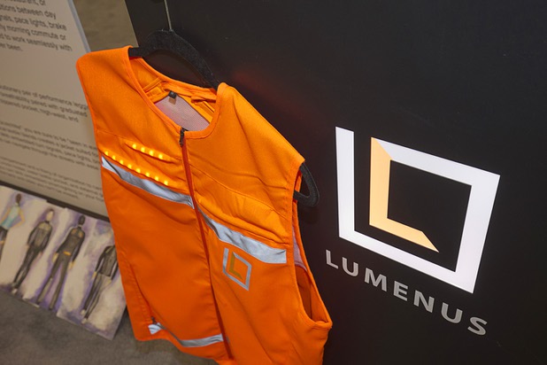 Reflective vest with embedded LED lights are displayed at the Lumenus booth during the Magic fashion convention at the Las Vegas Convention Center Thursday, Feb. 18, 2016. The products are expected to be available this summer.