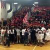 Coronado basketball fans storm the court to celebrate the Cougars' 70-32 victory against Eldorado in the Sunrise Regional championship game on Feb. 19, 2016, at Liberty High School.